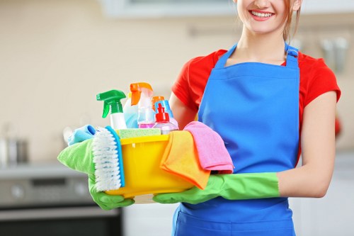 Local communal cleaning team working in a Hollandpark residential block